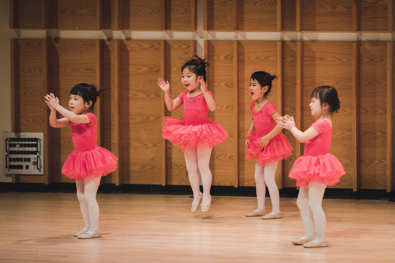 Ballet kids jumping for joy